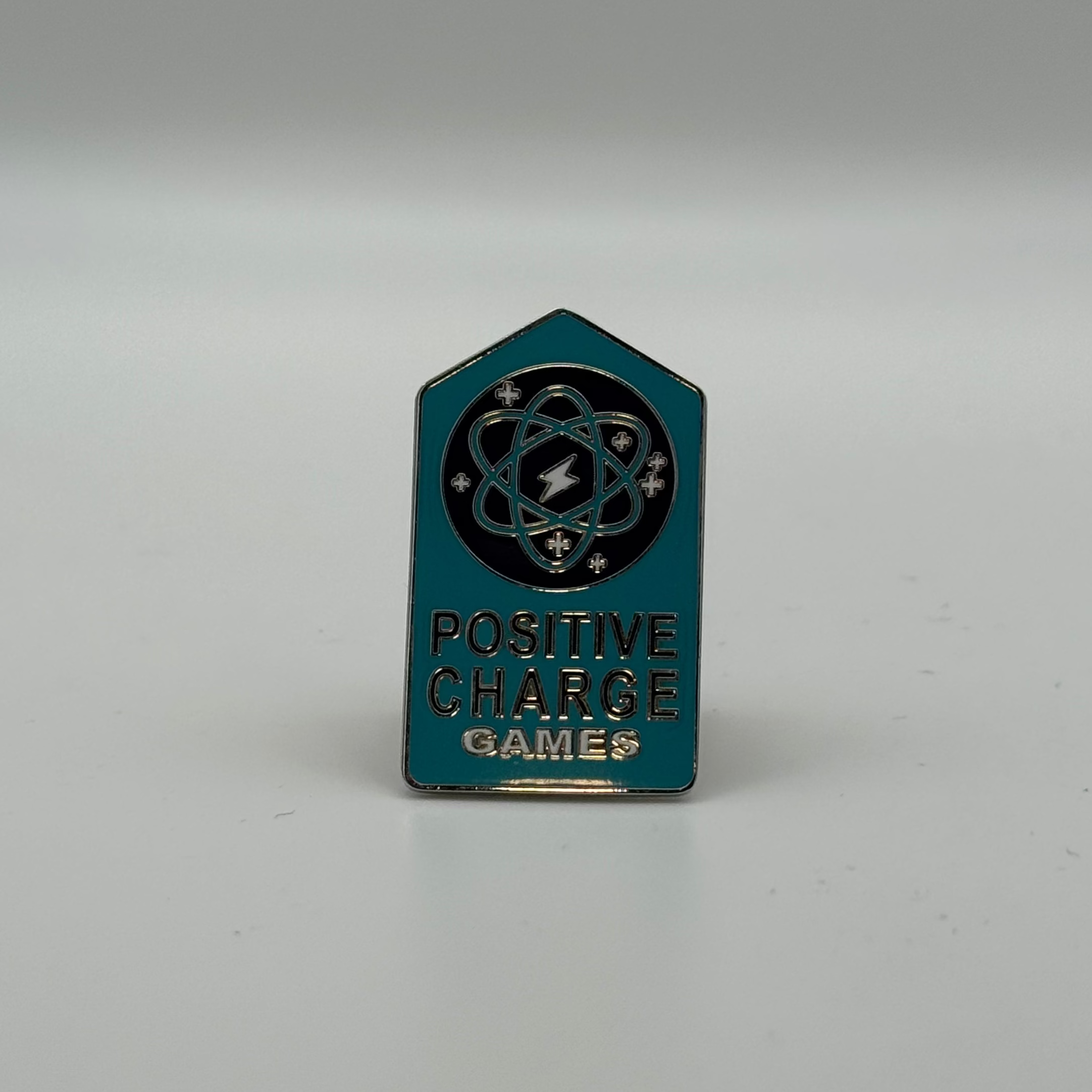 Positive Charge Pin
